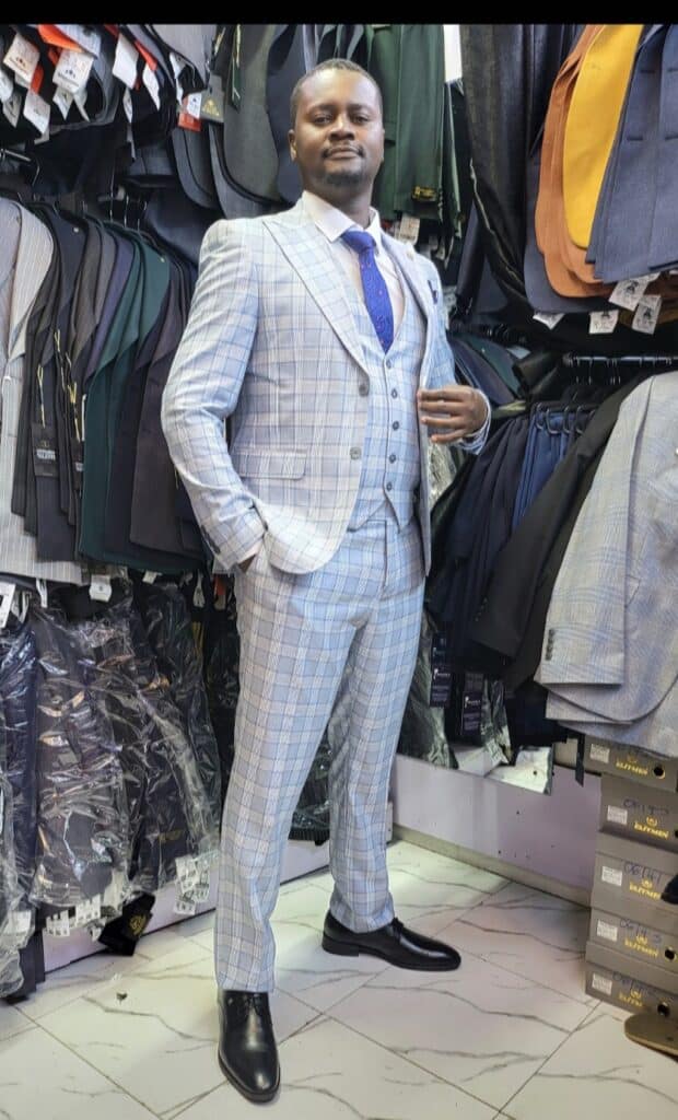 light blue checked suit